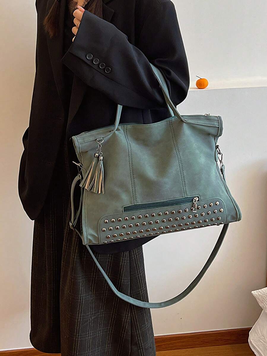 Vintage And Fashionable Large Capacity Commuter Tote Bag With Rivets And Tassels