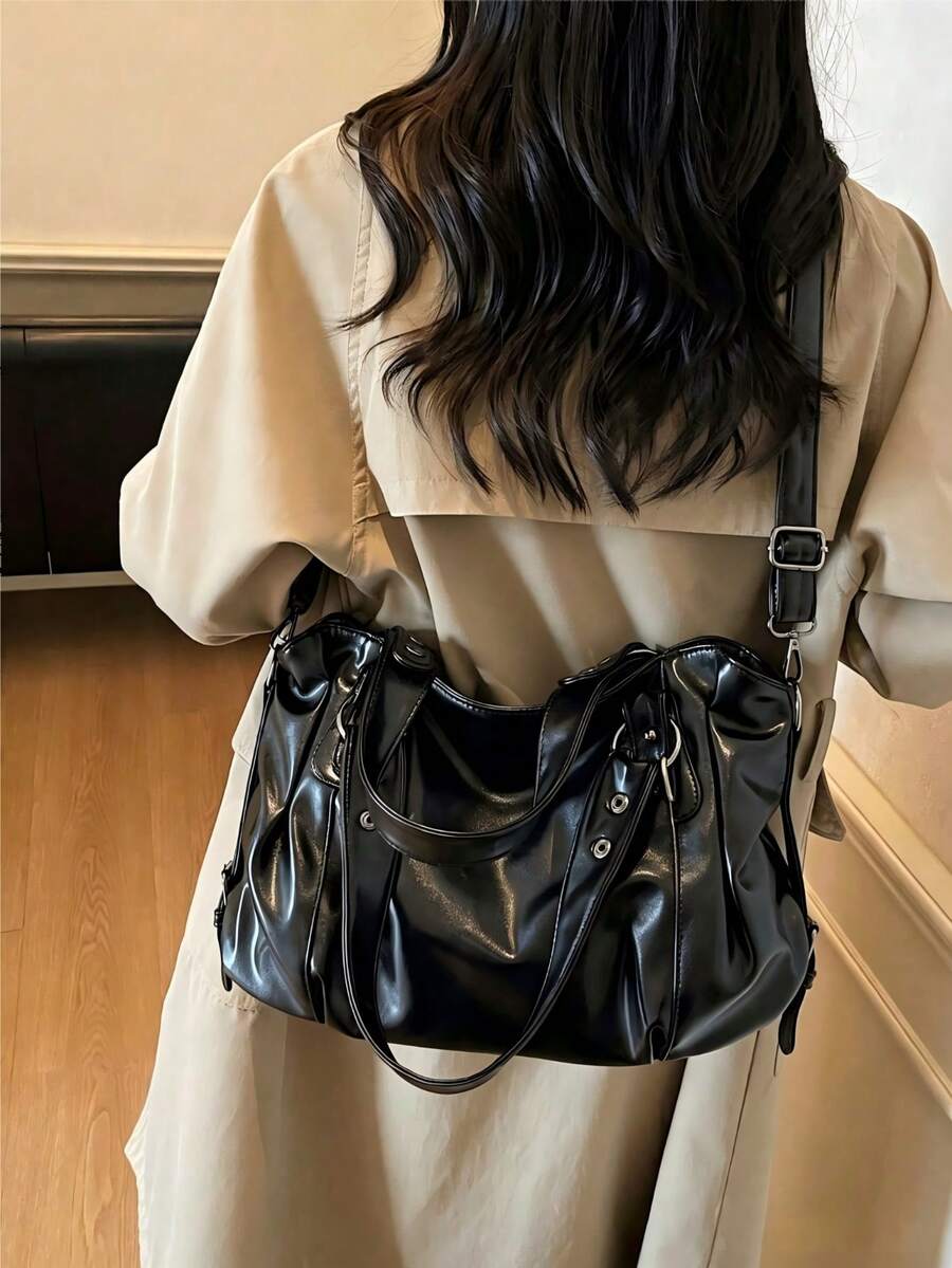 This Is A Fashionable And Minimalist Black Large-Capacity Women's Handbag, Featuring Smooth Metal Zippers, Dual Top Handles, And An Adjustable Long Shoulder Strap. The Ladies Can Wear It On The Should