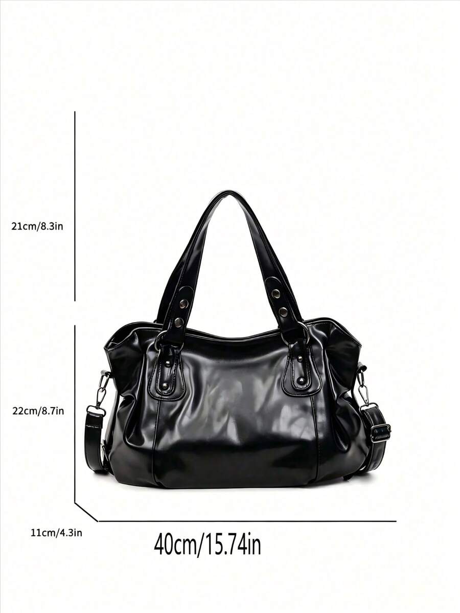This Is A Fashionable And Minimalist Black Large-Capacity Women's Handbag, Featuring Smooth Metal Zippers, Dual Top Handles, And An Adjustable Long Shoulder Strap. The Ladies Can Wear It On The Should
