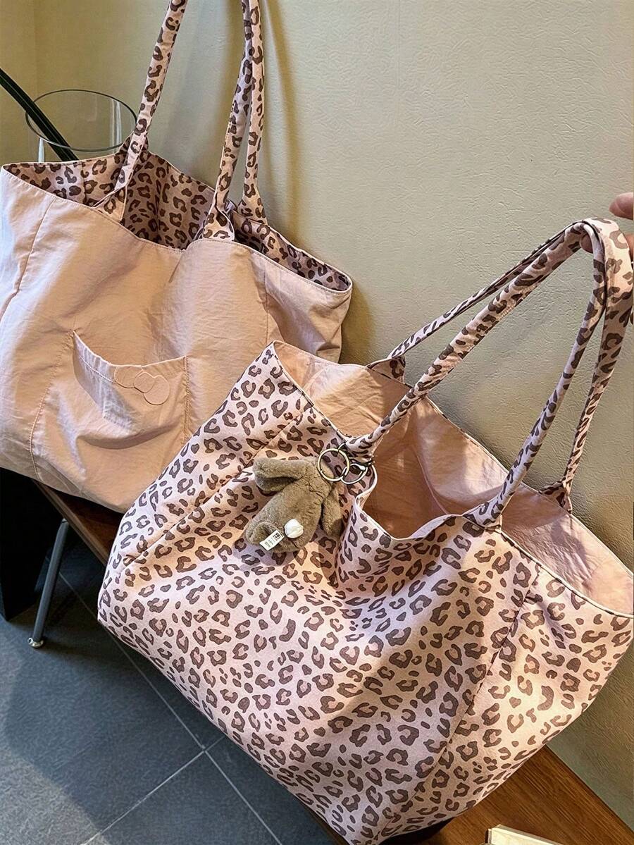 Pink Leopard Print Large Capacity 2-In-1 Tote Bag With Sturdy Dual Top Handles; Reversible Design, Functions As A Shopping Bag, Versatile Commuter Bag, And Multi-Purpose Organizer For Storing Headphon