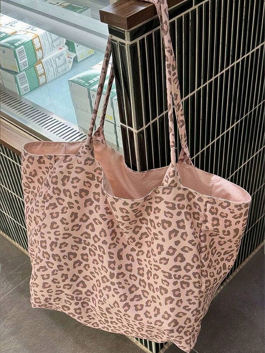 Pink Leopard Print Large Capacity 2-In-1 Tote Bag With Sturdy Dual Top Handles; Reversible Design, Functions As A Shopping Bag, Versatile Commuter Bag, And Multi-Purpose Organizer For Storing Headphon