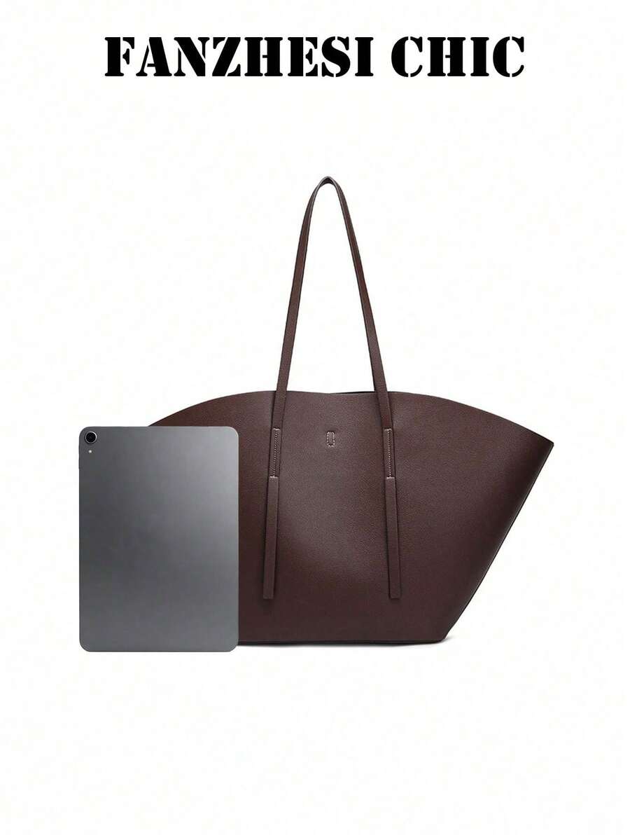 Distinctive Fan-Shaped Large Tote Bag With Wide Flared Silhouette, Reinforced Stitching At Shoulder Strap Attachment, Minimalist Embossed Logo On Front, Slim Shoulder Strap For Shoulder Carry, Open To