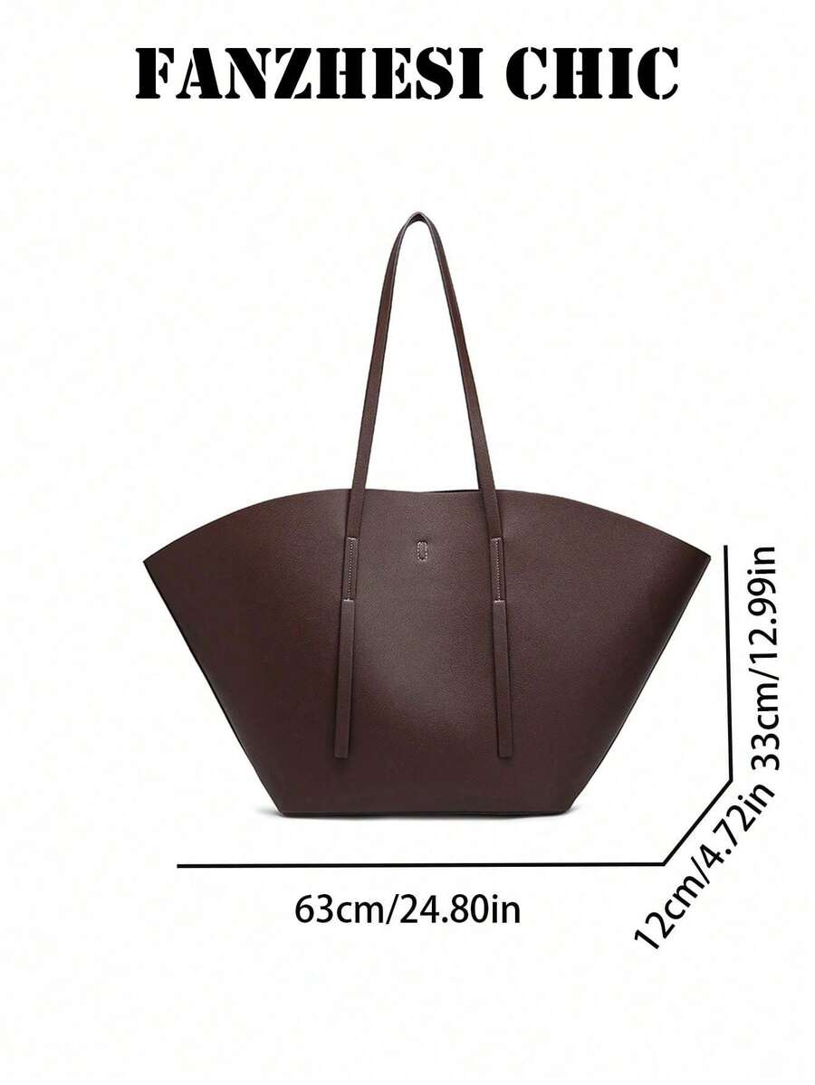 Distinctive Fan-Shaped Large Tote Bag With Wide Flared Silhouette, Reinforced Stitching At Shoulder Strap Attachment, Minimalist Embossed Logo On Front, Slim Shoulder Strap For Shoulder Carry, Open To