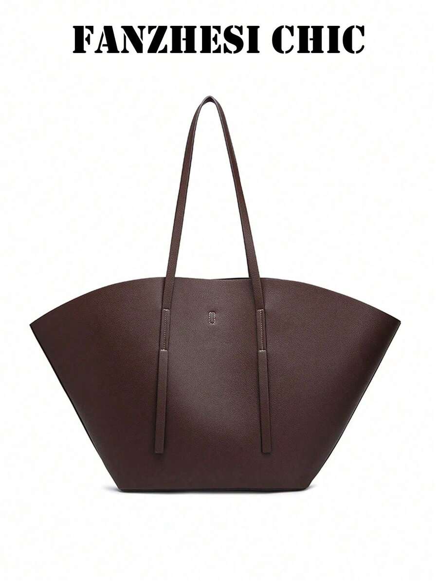 Distinctive Fan-Shaped Large Tote Bag With Wide Flared Silhouette, Reinforced Stitching At Shoulder Strap Attachment, Minimalist Embossed Logo On Front, Slim Shoulder Strap For Shoulder Carry, Open To